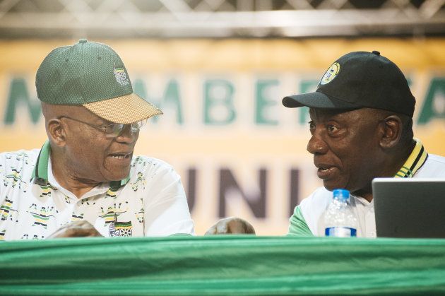 Jacob Zuma (L) speaks with Cyril Ramaphosa during the 54th national conference of the ANC in Johannesburg, South Africa, on Monday, Dec. 18, 2017.