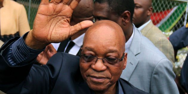 South Africa's President Jacob Zuma waves after addressing mourners outside the residence of former South African President Nelson Mandela in Johannesburg December 6, 2013.