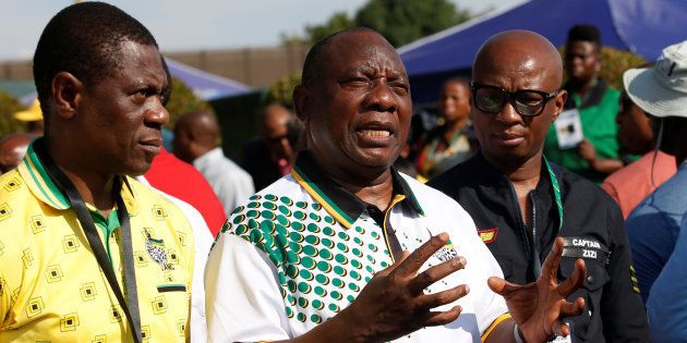 President of the African National Congress (ANC) Cyril Ramaphosa with Paul Mashatile (L) and spokesman Zizi Kodwa address the media at the Nasrec Expo Centre, where the 54th National Conference of the ruling party is taking place in Johannesburg, South Africa December 19, 2017. REUTERS/Rogan Ward