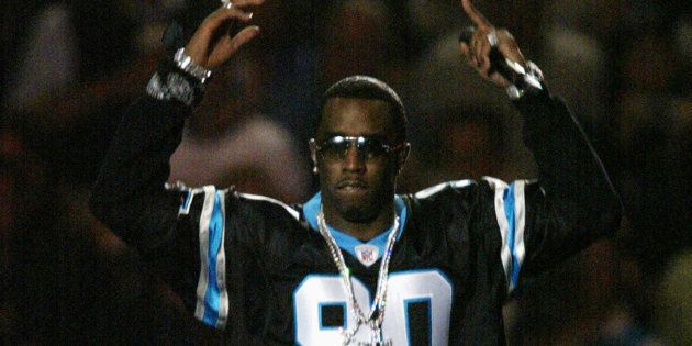 HOUSTON, TX - FEBRUARY 1: Sean 'P. Diddy' Combs performs during the halftime show at Super Bowl XXXVIII between the New England Patriots and the Carolina Panthers at Reliant Stadium on February 1, 2004 in Houston, Texas. (Photo by Donald Miralle/Getty Images) The Patriots won 32-29 to claim their second Super Bowl in three years. (Photo by Donald Miralle/Getty Images)