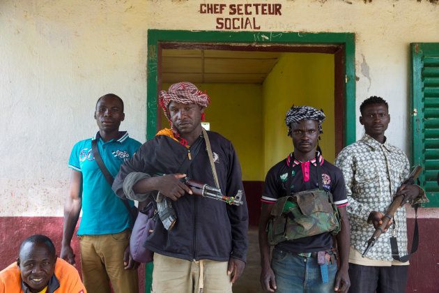 Members of the of the Anti-Balaka armed militia pose as they display their weapons in the in the town of Bocaranga, Central African Republic, April 28, 2017.