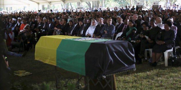 Mourners attend a funeral of Ahmed Kathrada, who was sentenced to life imprisonment alongside Nelson Mandela, at the Westpark Cemetery in Johannesburg, South Africa March 29, 2017.