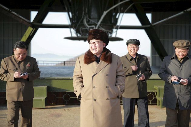 North Korea leader Kim Jong Un smiles as he visits Sohae Space Center in Cholsan County, North Pyongan province for the testing of a new engine for an intercontinental ballistic missile (ICBM) in this undated photo released by North Korea's Korean Central News Agency (KCNA) on April 9, 2016.