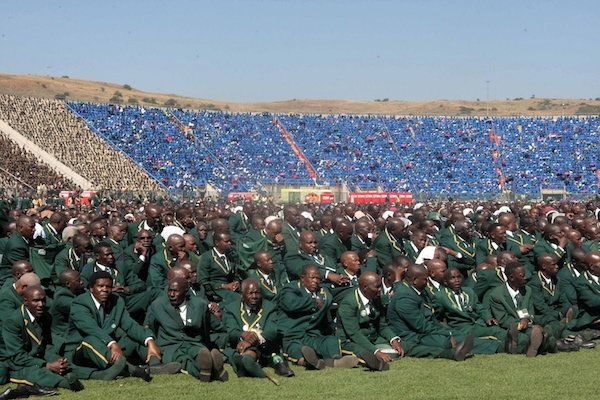 Members of the Zion Christian Church (ZCC) gather for a mass prayer meeting at Lucas Moripe Stadium in Atteridgeville, South Africa. The members marked the 100th anniversary of the 1913 Land Act.