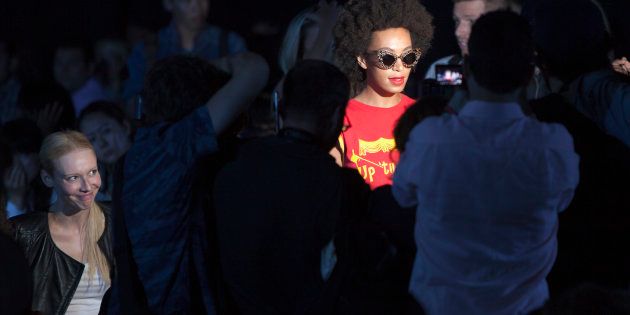 Solange Knowles (R) arrives for the Alexander Wang Spring/Summer 2014 collection during Fashion Week in New York, September 7, 2013. REUTERS/Carlo Allegri (UNITED STATES - Tags: FASHION ENTERTAINMENT)