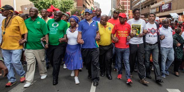 South African opposition parties leaders from (5th L to 10th R) Provincial Leader for the Democratic Alliance in Gauteng John Moodey, President and Leader of the Congress of the People Mosiuoa Lekota, Save SA chairman Sipho Pityana, President of centre-left South African party United Democratic Movement (UDM) Bantu Holomisa, Economic Freedom Fighters (FFF) leader Julius Malema, a member of the Inkatha Freedom Party (IFP) and a member of African Christian Democratic Part.