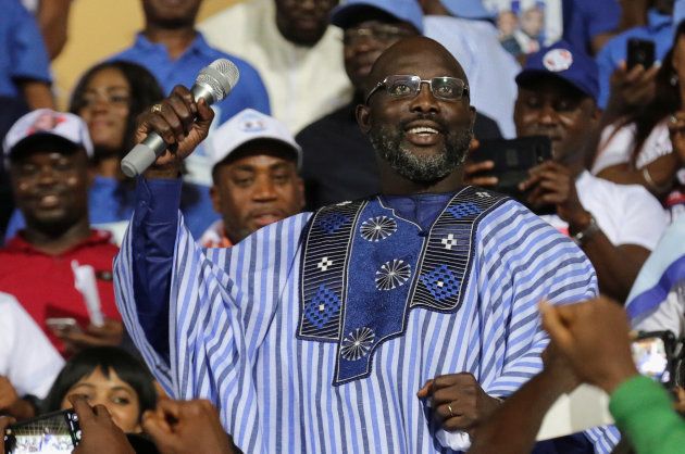 George Weah, former soccer player and presidential candidate of Congress for Democratic Change (CDC), reacts while a speech during the party's presidential campaign rally at Samuel Kanyon Doe Sports Complex in Monrovia, Liberia, December 23, 2017. REUTERS/Thierry Gouegnon