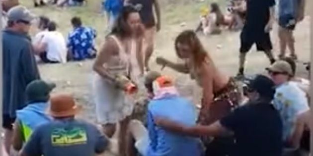 A woman hits the man who allegedly groped her at New Zealand's Rhythm and Vines festival