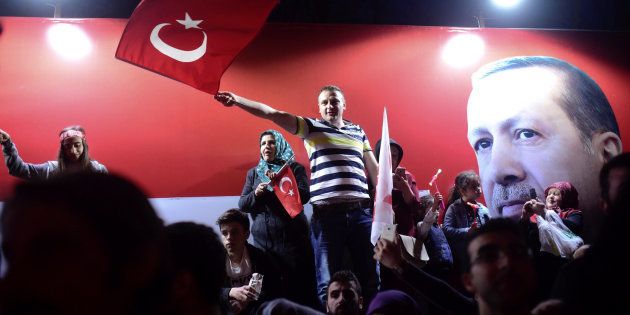Supporters of Turkey's President Tayyip Erdogan celebrate in Istanbul, Turkey April 16, 2017.