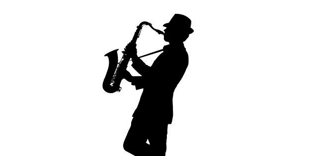 One person playing a tenor saxophone