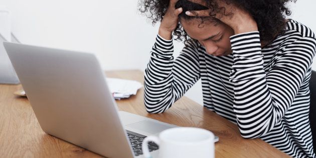 Shot of a young woman having a stressful day at workhttp://195.154.178.81/DATA/i_collage/pu/shoots/805809.jpg