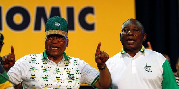 South Africa's President Jacob Zuma sings next to newly elected president of the ANC Cyril Ramaphosa during the 54th National Conference of the ruling African National Congress (ANC) at the Nasrec Expo Centre in Johannesburg, South Africa December 18, 2017.
