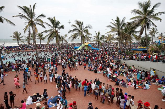 Revellers enjoy New Year's Day on a beach in Durban, South Africa, January 1, 2018. REUTERS/Rogan Ward