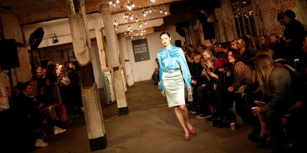 A model presents a creation at the Oxfam catwalk show using second-hand charity clothes during London Fashion Week in London, Britain February 16, 2017.