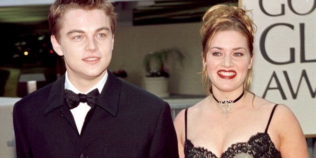 Actor Leonardo DiCaprio (L) arrives with actress and Titanic co-star Kate Winslet for the 55th Annual Golden Globe Awards at the Beverly Hilton 18 January 1998 in Beverly Hills, CA.