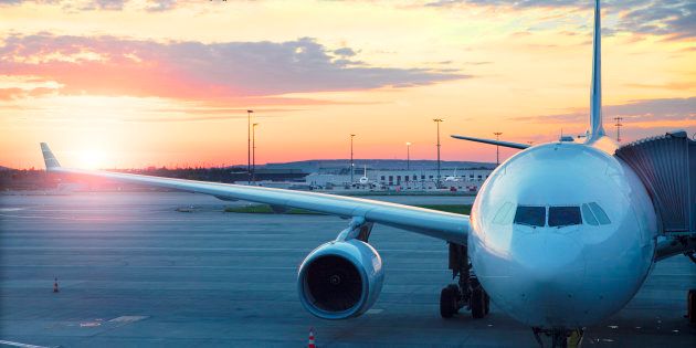 Charles De Gaulle , International airport in Paris - Airplane at sunrise.