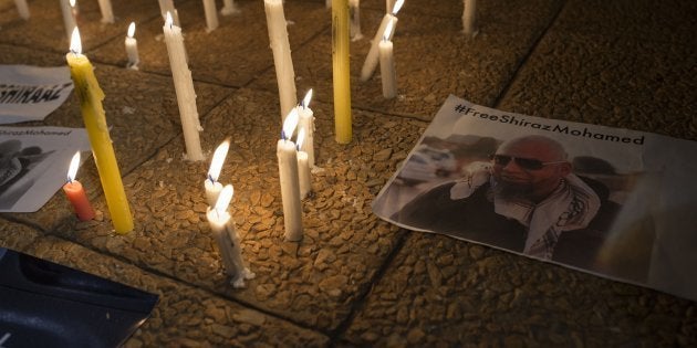 People gather at the Lenasia South Civic Centre to pray for the South African journalist Shiraaz Mohamed, who was kidnapped in Syria last year.