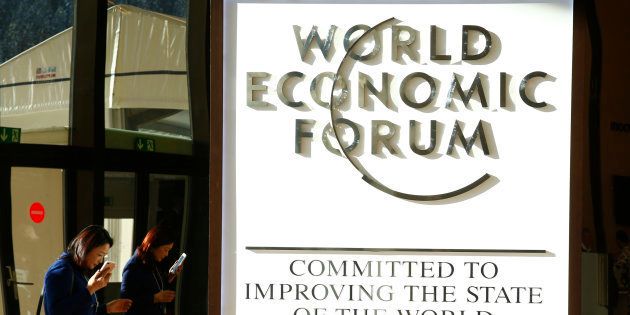 An attendee arrives in the Congress Hall during the World Economic Forum (WEF) annual meeting in Davos, Switzerland January 20, 2017.