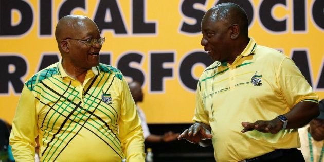 Deputy President Cyril Ramaphosa (R) chats with President Jacob Zuma during the 54th national conference of the ANC. December 16, 2017.