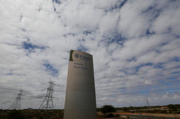 Pylons carry electricity from a sub-station of state power utility Eskom outside Cape Town in this picture taken March 20, 2016. REUTERS/Mike Hutchings