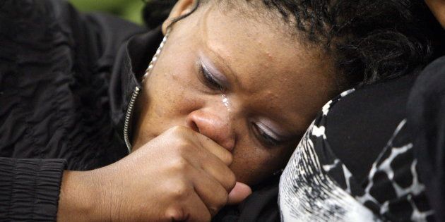 Andries Tatane's widow Rose Tatane on April 25, 2012 in Ficksburg, South Africa at the courthouse where seven policemen were on trial for her husband's death.