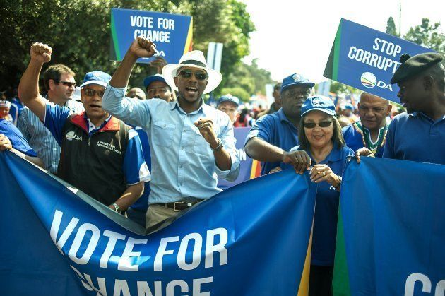 Democratic Alliance Leader Mmusi Maimane (L) and DA Cape Town mayor Patricia De Lille (R) lead thousands of South African main opposition party Democratic Alliance (DA) supporters marching to the Constitutional Court to protest against South African President Jacob Zuma on April 15, 2016 in Johannesburg. South African municipal elections are set to be contested on August 3. / AFP / MUJAHID SAFODIEN (Photo credit should read MUJAHID SAFODIEN/AFP/Getty Images)