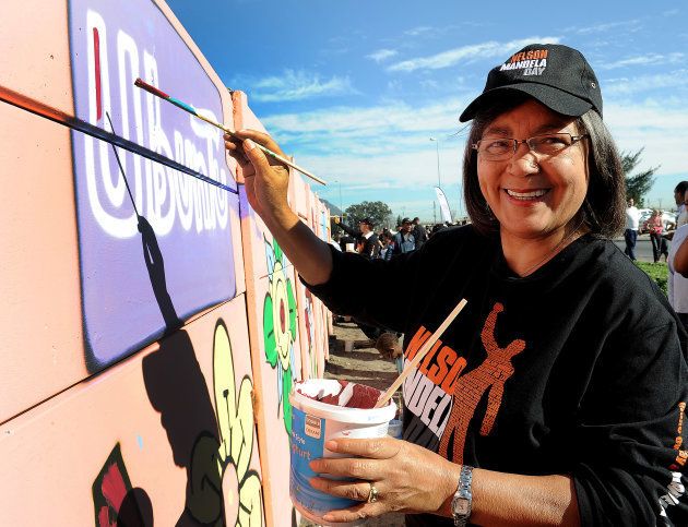 Mayor of Cape Town, Patricia de Lille cleaning up graffiti on walls for International Nelson Mandela Day on July 18, 2012 in Cape Town, South Africa. (Photo by Nasief Manie/Foto24/Gallo Images/Getty Images)