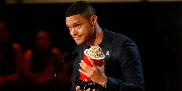 Trevor Noah accepts the award for Best Host at the 2017 MTV Movie and TV Awards ceremony.