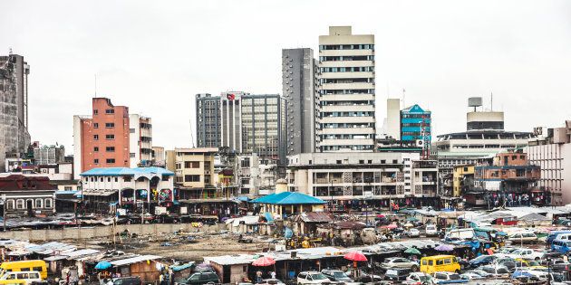 Parking lot and office buildings in Lagos Island's commercial district.