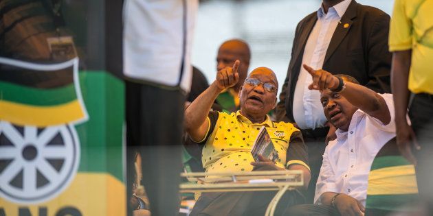 President Jacob Zuma (L) and President of Kenya Uhuru Kenyatta attend the ANC's 106th-anniversary celebrations at Absa Stadium in East London, South Africa, on January 13, 2018.