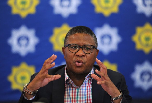 Police Minister Fikile Mbalula addresses the media at the lodge where Dutch tourists were robbed after they arrived from the OR Tambo International Airport on September 26, 2017 in Fourways, South Africa. Mbalula said the robbery of Dutch tourists was an attack on the tourism sector and the economy. (Photo by Felix Dlangamandla/Foto24/Gallo Images/Getty Images)