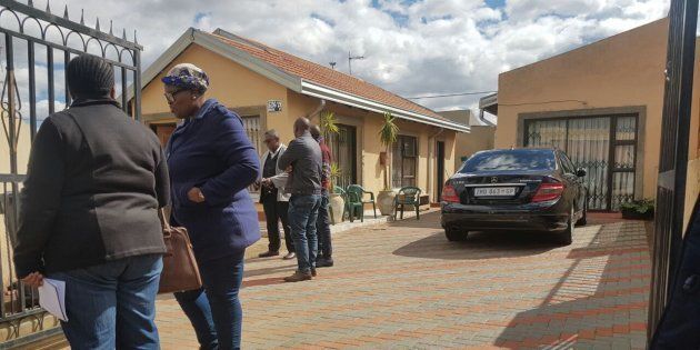 Scenes from outside Mandla Hlatshwayo's family home in Chiawelo, Soweto.