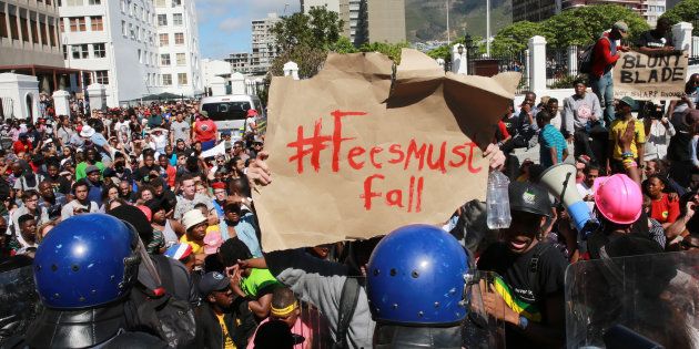South African students protest outside Parliament on October 21, 2015, in Cape Town.