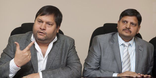 Indian businessmen, Ajay Gupta (R) and younger brother Atul Gupta.