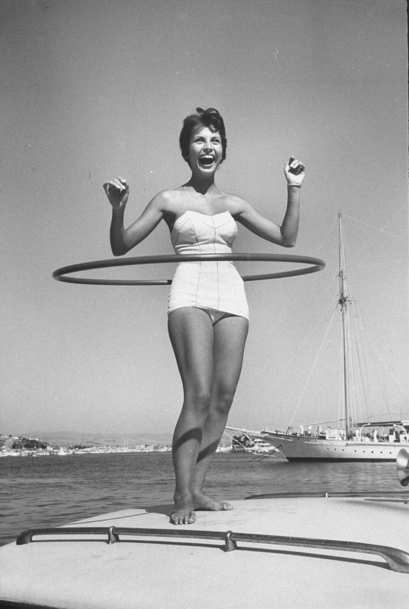 Bonnie Manchester demonstrates a hoop in Newport Beach, California, in 1958.