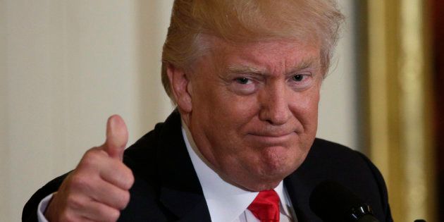 U.S. President Donald Trump gestures while attending a “celebration of military mothers