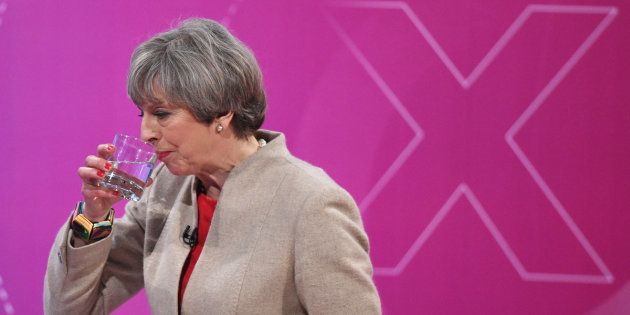 Prime Minister Theresa May sips some water as she takes part in the BBC's Question Time on Friday