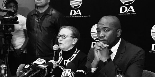 Helen Zille answers questions during a press conference in Johannesburg on Tuesday, 13 June 2017, while DA leader Mmusi Maimaine listens intently. The tension between the two was palpable.