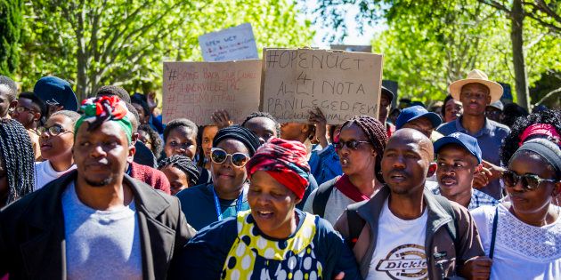 University of Cape Town students march during the #FeesMustFall protest on October 03, 2016 in Cape Town, South Africa.