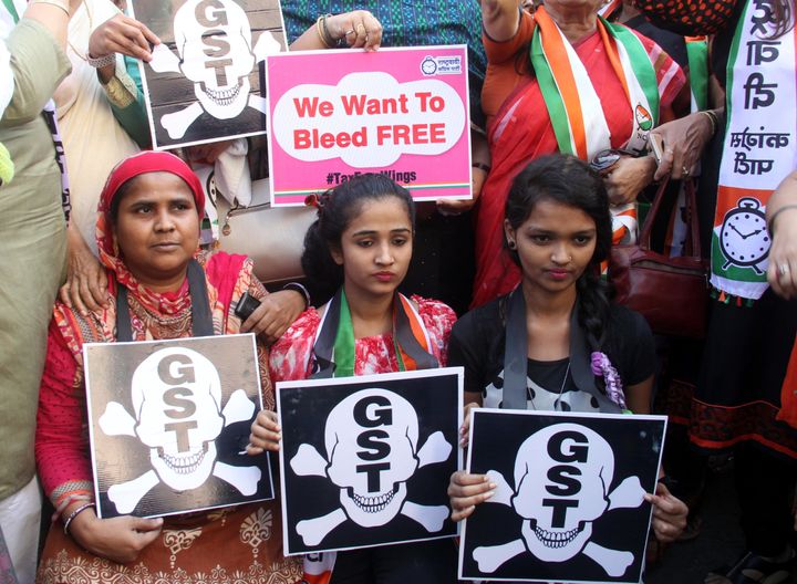 File photo of a protest held by the women's wing of the Nationalist Congress Party outside the Sales Tax office in Mumbai demanding exclusion of sanitary napkins from the GST ambit. After many protests, the Modi government put sanitary pads outside the GST but consumers say that has not led to any significant reduction in prices. 
