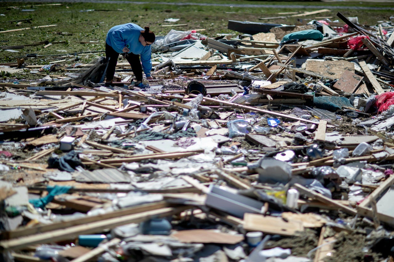 Residents searched through the rubble to find anything that could be salvaged.