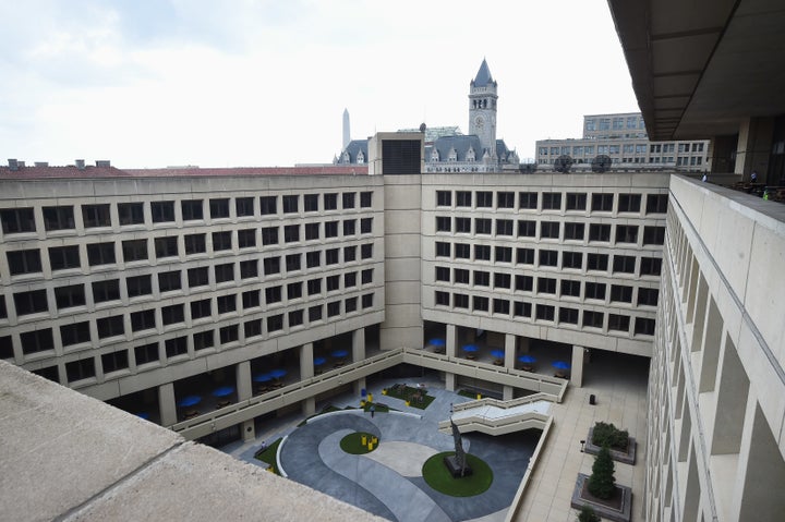 The courtyard of the FBI's J. Edgar Hoover building with the Old Post Office building, which houses the Trump International H