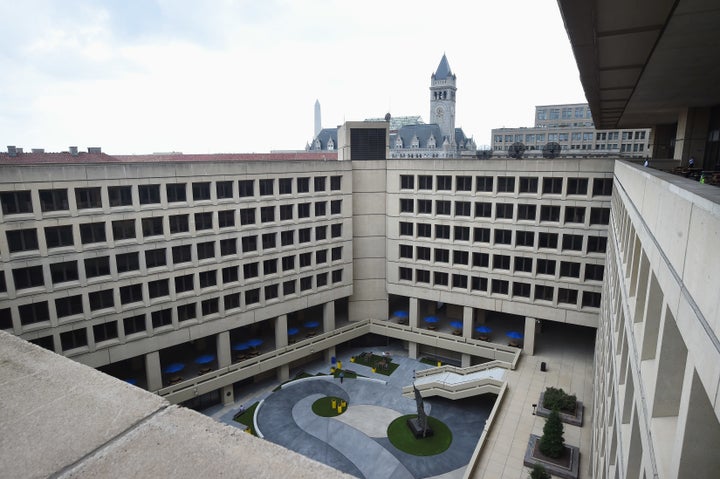 The courtyard of the FBI's J. Edgar Hoover building with the Old Post Office building, which houses the Trump International Hotel, in the background.