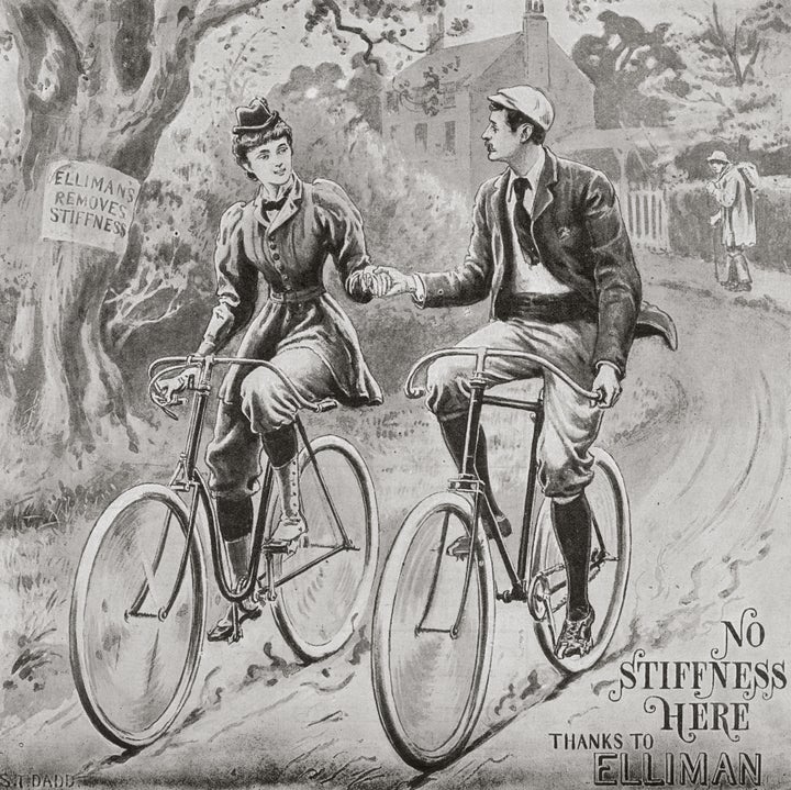 A woman, wearing a type of bloomers, rides her bicycle alongside a man in this 1895 advertisement.&nbsp;