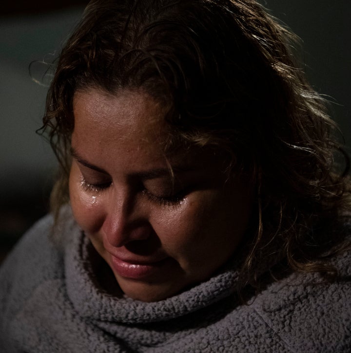 Luisa Hidalgo, 31, from El Salvador, sits for a portrait in Hotel Salazar in Tijuana, Mexico on Feb. 14, 2019 while waiting t