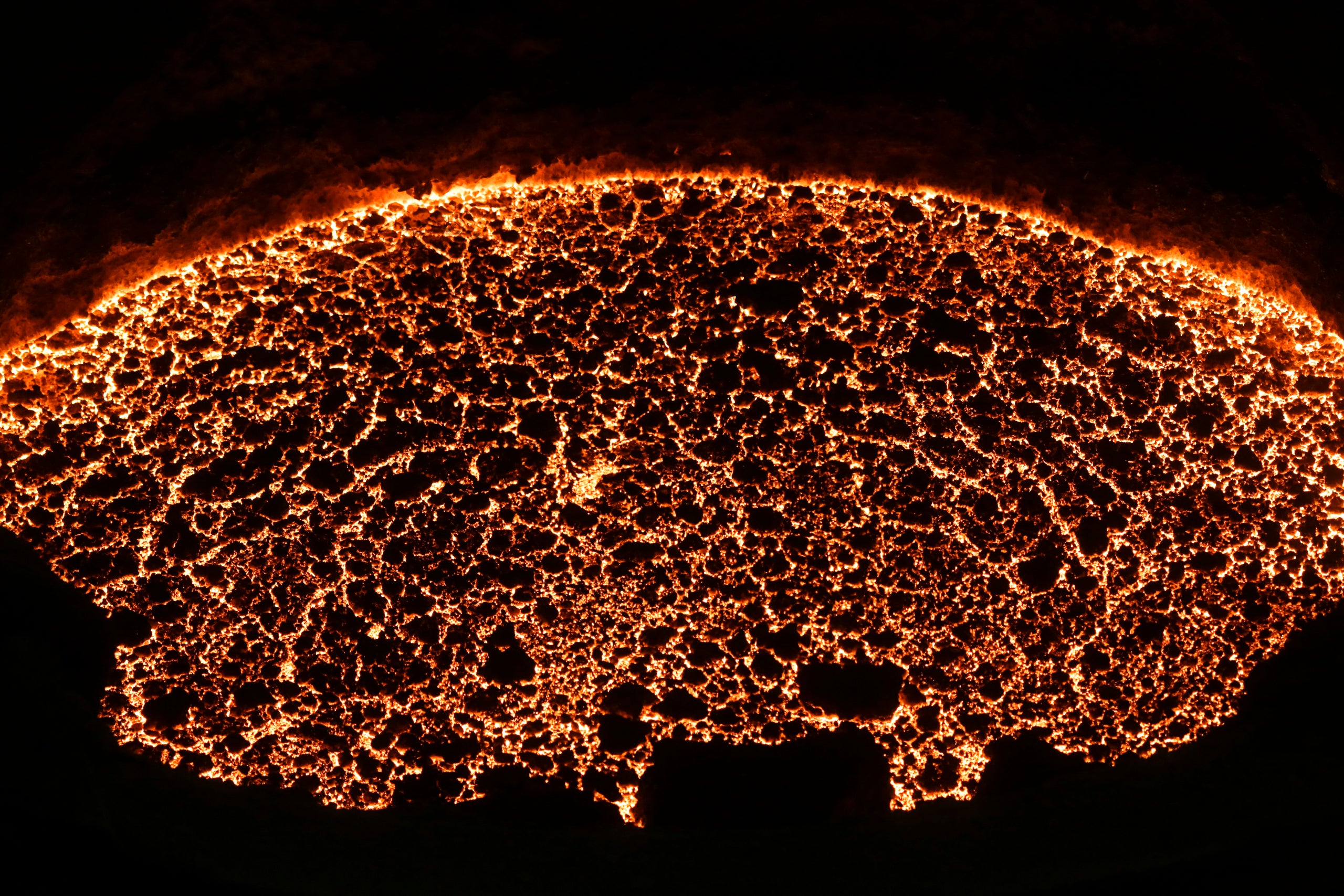 Liquid iron in a steel-pouring ladle waits for further processing, during a guided media tour at the steel producer Salzgitte