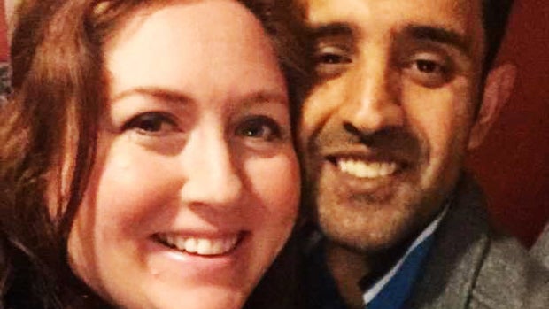 Jennifer Asif, left, and her husband Adnan Asif, right, pose for a selfie. 