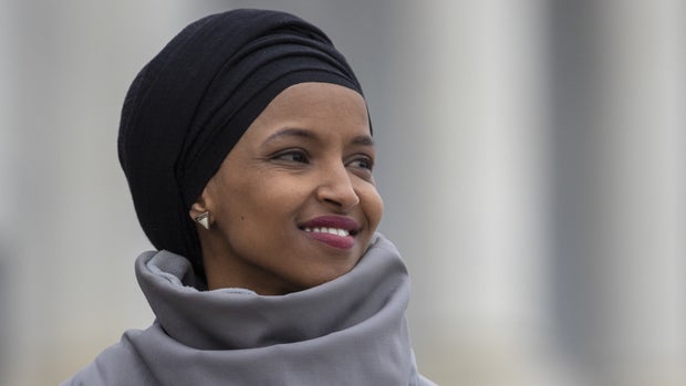 Representative Ilhan Omar, Democrat from Minnesota, smiles during a news conference in Washington, D.C., U.S., on Friday, March 8, 2019. House Democrats are set to approve H.R. 1, a far-reaching elections and ethics bill that would change the way congressional elections are funded, impose new voter-access mandates on states, require groups to publicize donors and force disclosure of presidential candidates' tax returns. Photographer: Alex Edelman/Bloomberg via Getty Images