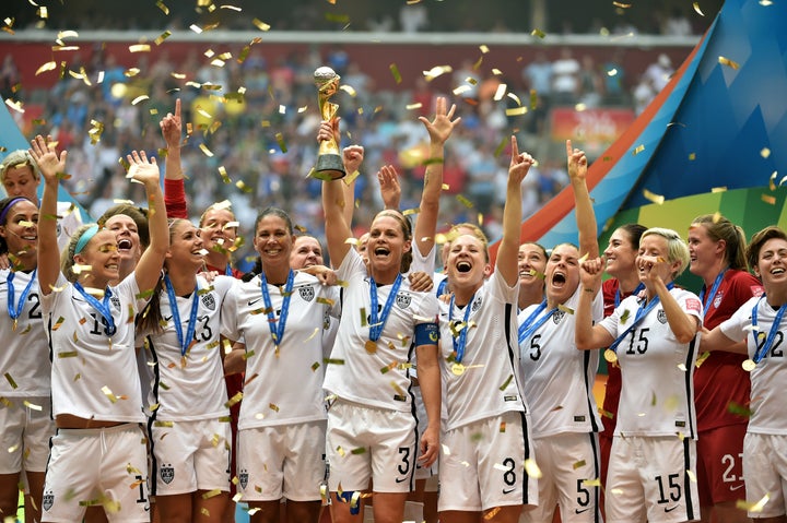 The US Women's soccer team holds the World Cup Trophy after their 5-2 win over Japan in the FIFA Women's World Cup in 2015.