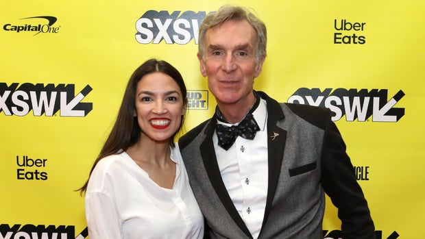 AUSTIN, TX - MARCH 09:  (L-R) Alexandria Ocasio-Cortez and Bill Nye attend Featured Session: Alexandria Ocasio-Cortez and the New Left during the 2019 SXSW Conference and Festivals at Austin Convention Center on March 9, 2019 in Austin, Texas.  (Photo by Samantha Burkardt/Getty Images for SXSW)